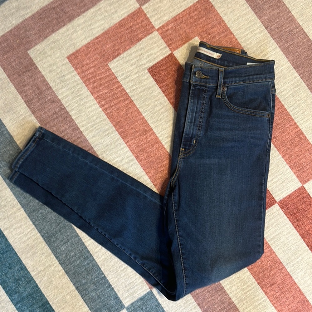 Levi’s - skinny jeans (medium rinse)